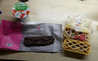 Yogurt, coconut chocolate bar, linzer tart