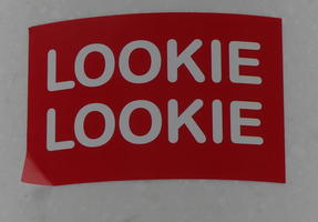 Sticker with white letters on red