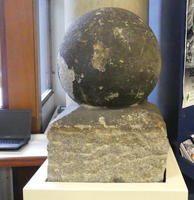 Large brown spherical stone