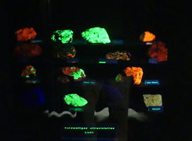 Fluorescent minerals under UV light in green and orange