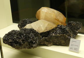 White crystals on black stone