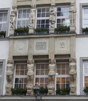 Two rows of four sculptures