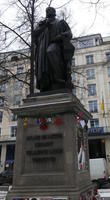 Monument with man standing atop