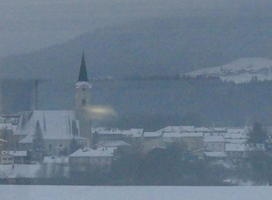 Village with church at left