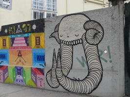 At left, grid of symbols; at right, elephant-like creature