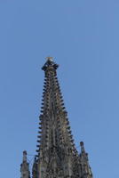 Church steeple with gold cross on top