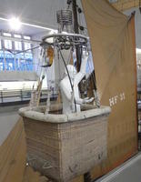 Plaster mannequin of man in balloon basket