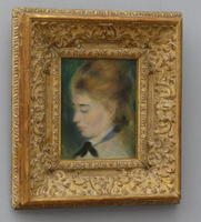 portrait of woman's head with eyes closed and head tilted down