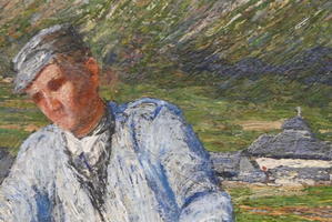 Closeup of man ad house in background showing brush work