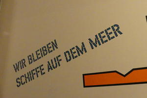 Stenciled letters on wall