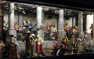 Scene with 1800s style people at outdoor cafe
