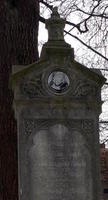 Grave marker with engraving weathered away