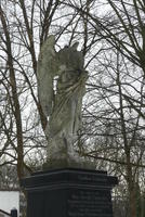 Sculpture of angel missing arm and head