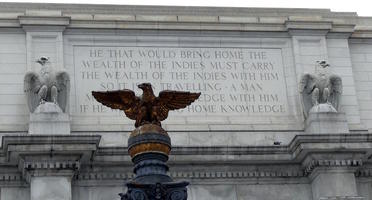 Bronze eagle flanked by sculptured eagles