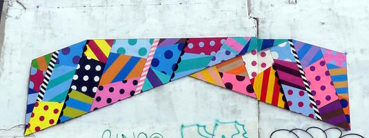 Polka-dotted and striped “ribbon”