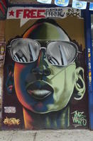 African-American man in reflective sunglasses