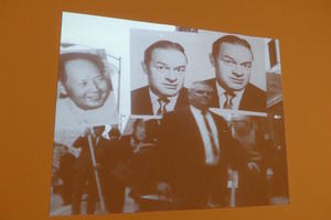 People carrying large posters of Bob Hope and Mao Tse-Tung