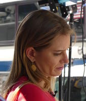 NBC reporter looking down at her text