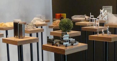 Tables with miniatures made of household objects