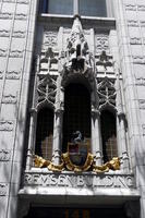 Medieval-style architecture above entrance to building