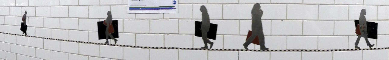 Silhouettes of commuters