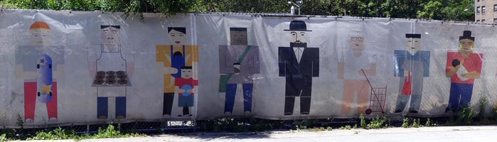 square-ish cartoons of people on construction fence