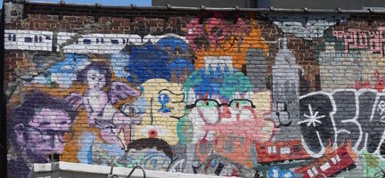 Graffiti of subway cars and people