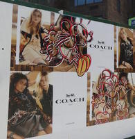 Coach advert poster with images of Mickey Mouse “graffitti'ed” on them