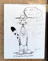 Cartoon cat (Griim the Street Kat) with pot on head as hat; word balloon contains indecipherable writing