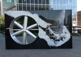 artwork of wheel and picture of melted ice cream cone
