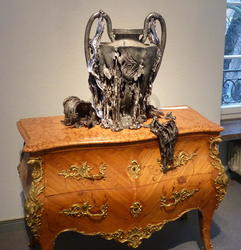 melted trophy on desk