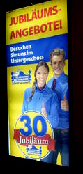 Ultra-whitebread models on ad for mattress store.