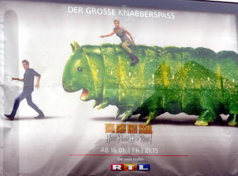 signage weird caterpillar ad