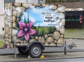 painted house and garden trailer