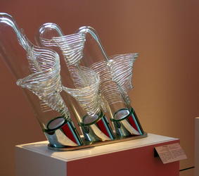 Three angled spirals of glass