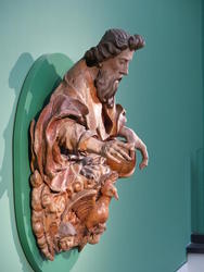Carved bust of man, side view
