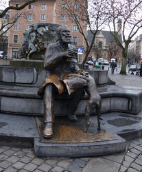 seated man w dog