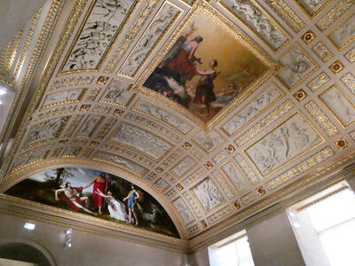 Ceiling with gold decorations, carvings, and paintings