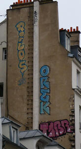 Vertically-oriented names one to two stories tall