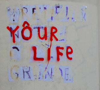 YÔUR LIFE (in red paint)
