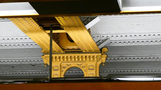 metalwork in subway station ceiling