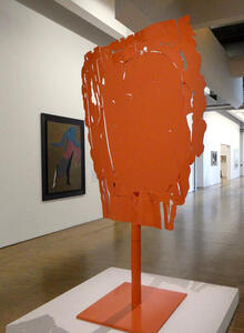 flat orange metal sculpture