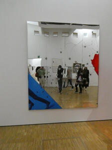 mirror with bullet holes