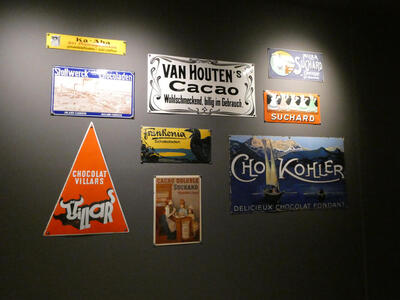 signs for various brands of chocolate