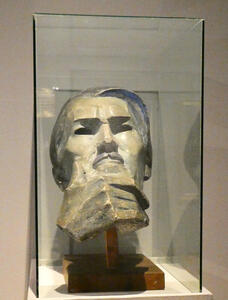 bust of man with hand on chin