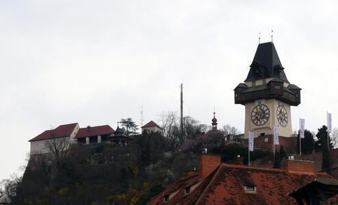 Clock tower and Castle Mountain; view from Hauptplatz