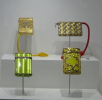 Green and gold square containers