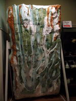 Abstract flowing sculpture with Navier-Stokes equations printed on it