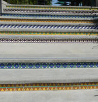 Staircase with geometric tiles on the risers