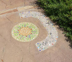 Bright stones embedded in paving